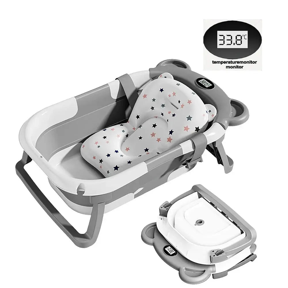 Baignoire Pliable Bébé Éco avec thermomètre intégré, coussin étoilé et design compact pour un bain sécurisé et confortable à la maison.